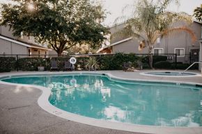 Davis townhouse for rent - a swimming pool with a house in the background