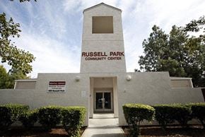 Davis apartment for rent - the front entrance of russell park community center with the door open