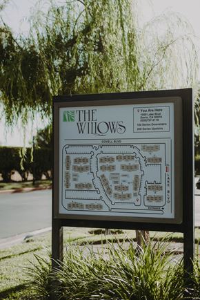 Davis apartment for rent - a sign for the willows on the side of a street