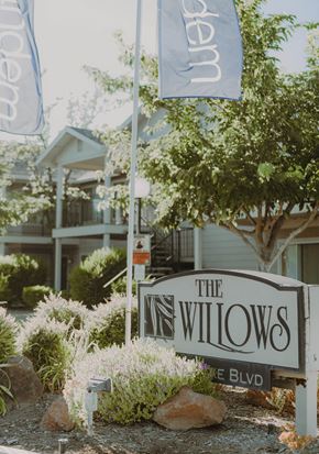 Davis apartment for rent - a sign for the willows in front of a house