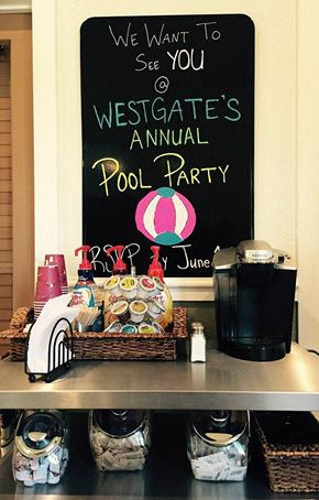 Woodland apartment for rent - a pool party is set up on a table with a sign