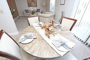 Lexington apartment for rent - a dining room table set with seashells on top of it