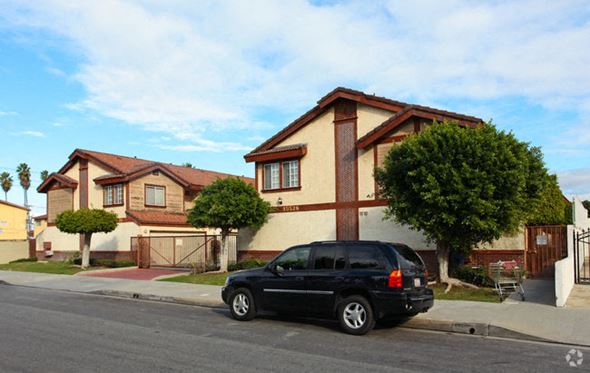 Norwalk apartment for rent - a black van parked in front of a house