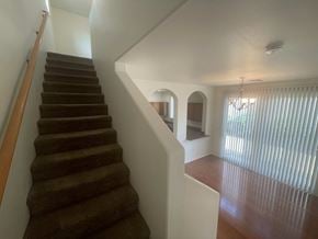Gilbert house for rent - a view of a staircase in a house from the bottom of it