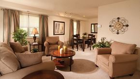 Essex apartment for rent - a living room with couches and chairs and a table