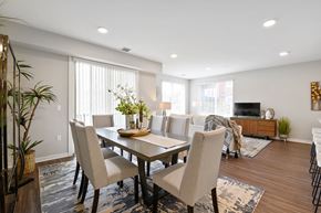 Wynnewood apartment for rent - Large dining area with sunny windows, overhead lighting, and vinyl hardwood flooring
