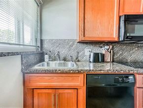San Jose apartment for rent - a kitchen with a sink and a microwave