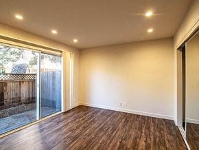 Mountain View apartment for rent - an empty living room with a sliding glass door