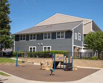 Burnsville apartment for rent - a playground in front of a house