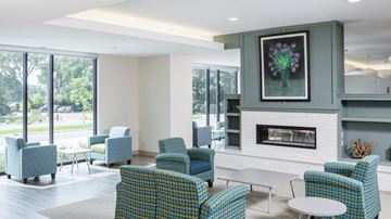 Golden Valley apartment for rent - a living room with chairs and a fireplace