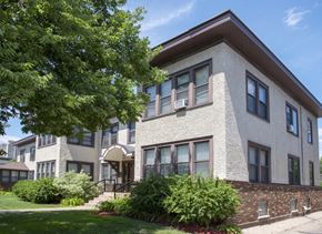 Minneapolis apartment for rent - an apartment building with a tree in front of it