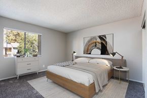 Redlands apartment for rent - a bedroom with a bed and a window