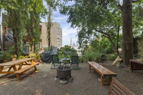 San Francisco apartment for rent - A backyard with a picnic table and a fire pit.