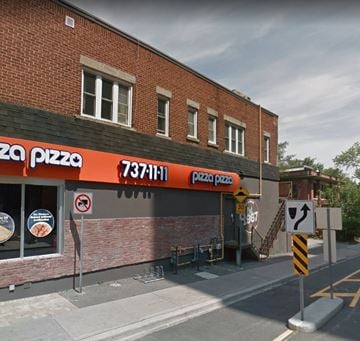 Ottawa apartment for rent - a pizza restaurant on the corner of a city street