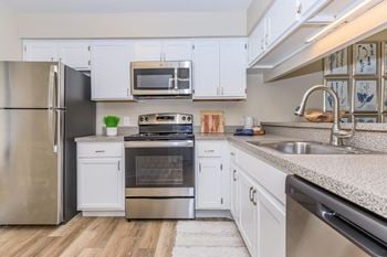 Open-concept kitchen with stainless steel appliances