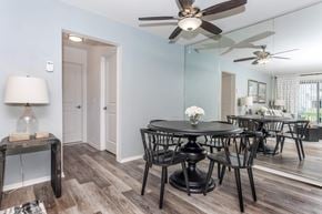 Rochester Hills apartment for rent - a dining room with a table and chairs