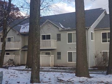 Cuyahoga Falls apartment for rent - the back of our house in the snow