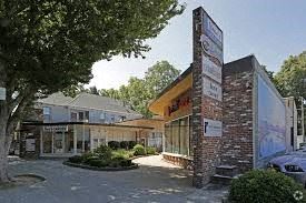 Sacramento apartment for rent - a building with a sign in front of it