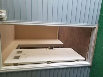 Rootstown apartment for rent - A white door is open to a cabinet.