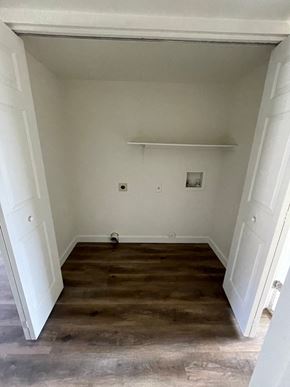 Mesa apartment for rent - A room with a wooden floor and white walls.