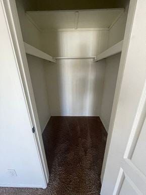 Mesa apartment for rent - A white closet with a door and a shelf.