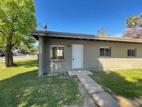 Mesa apartment for rent - A house with a white door and a small porch.