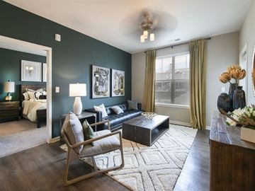 Longmont apartment for rent - a living room with a couch and a table