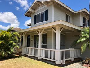 Kapolei house for rent - A house with a white porch and a sign on the front door.