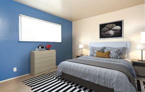 Hayward apartment for rent - A bedroom with a bed, nightstand, and lamp.