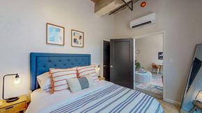 Albany apartment for rent - a bedroom with a bed and a tv