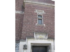 Troy apartment for rent - a window on the side of a brick building