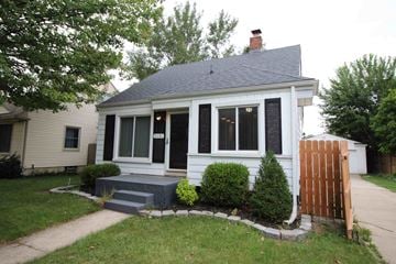 Ferndale house for rent - a small white house with black shutters and a sidewalk