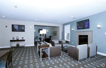 Bridgewater apartment for rent - A living room with a fireplace and a television on the wall.