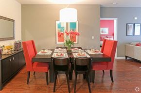 Bridgewater apartment for rent - A dining room with a table set for a meal.