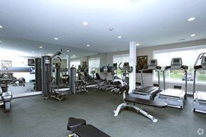 Bridgewater apartment for rent - A gym with a variety of equipment including treadmills, weights, and exercise machines.