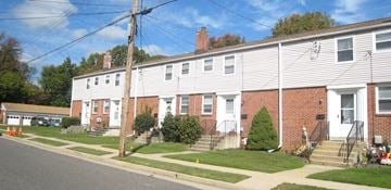 Pitman apartment for rent - a row of houses on the corner of a street
