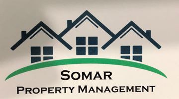 Fresno apartment for rent - the logo is shown on a wall