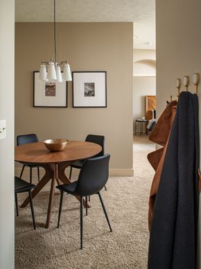 Omaha apartment for rent - A dining room with a round table and chairs.