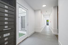 San Francisco apartment for rent - A long hallway with mailboxes on the wall.