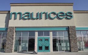 Fargo apartment for rent - the front of a mannequins store with green doors