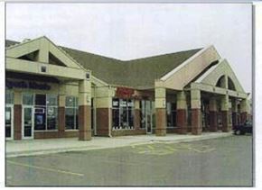 Fargo apartment for rent - the front of a building with a parking lot