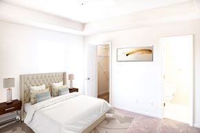 Belton triplex for rent - a bedroom with a white bed and a white closet