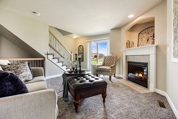 Kansas City townhouse for rent - a living room with a couch and a fireplace