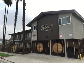 Los Angeles apartment for rent - a building with wooden barrels on the side of it