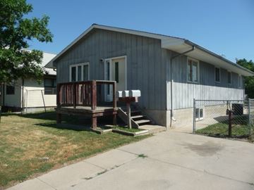 Kearney apartment for rent - a house with a wooden deck in front of it
