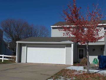 Kearney apartment for rent - a white garage door in front of a house