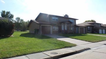 Kearney apartment for rent - a house with a sidewalk in front of it