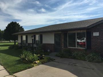 Kearney apartment for rent - a house with a red car in the window