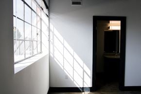 Richmond apartment for rent - a room with a large window and a door