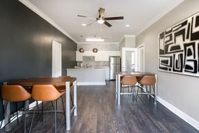 Sherwood apartment for rent - A modern kitchen with a dining table and chairs.